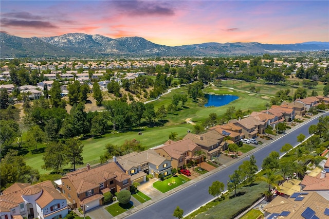 45339 Tiburcio Dr, Temecula, CA 92592 - aerial view at dusk of a water and mountain view, a residential view, and golf course view