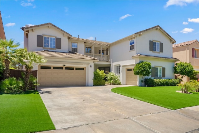 45339 Tiburcio Dr, Temecula, CA 92592 - view of front of property featuring driveway, a garage, stucco siding, and a front lawn