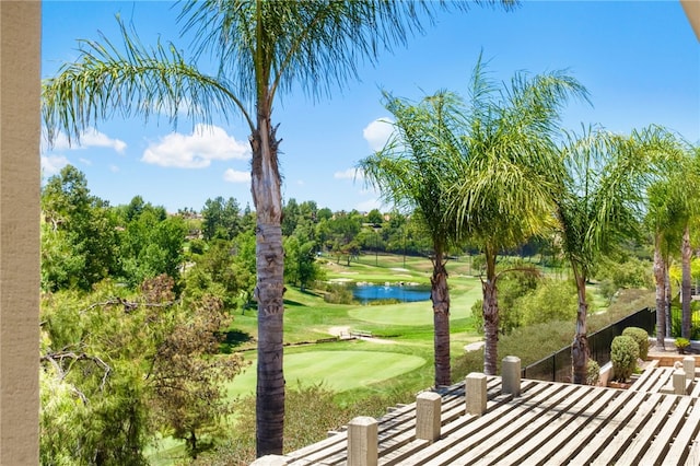 45339 Tiburcio Dr, Temecula, CA 92592 - view of green lawn with an area to practice putting, golf course view, and a water view
