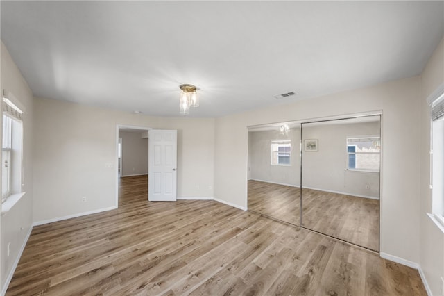 45339 Tiburcio Dr, Temecula, CA 92592 - unfurnished bedroom with wood finished floors and a closet