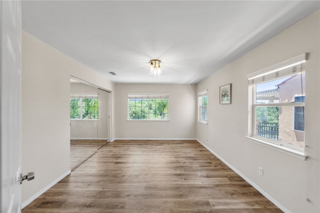 45339 Tiburcio Dr, Temecula, CA 92592 - empty room featuring wood finished floors and baseboards