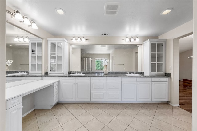 45339 Tiburcio Dr, Temecula, CA 92592 - full bathroom featuring double vanity and tile patterned flooring