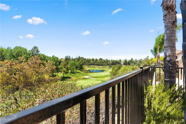 45339 Tiburcio Dr, Temecula, CA 92592 - balcony with golf course view, a water view, and view of wooded area