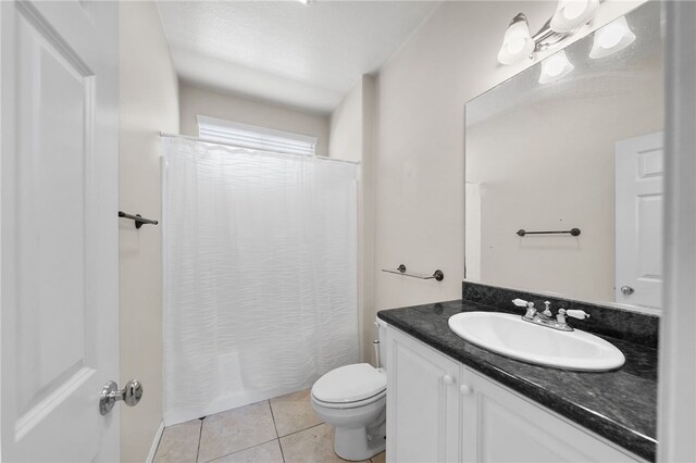 45339 Tiburcio Dr, Temecula, CA 92592 - full bathroom featuring vanity, tile patterned flooring, and shower / tub combo with curtain