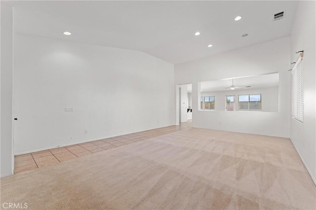 42619 Meridian Way, Lancaster, CA 93536 - carpeted spare room with a ceiling fan, recessed lighting, tile patterned flooring, and lofted ceiling