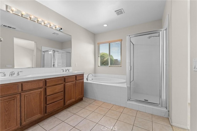 42619 Meridian Way, Lancaster, CA 93536 - bathroom with double vanity, a garden tub, tile patterned flooring, and a shower stall