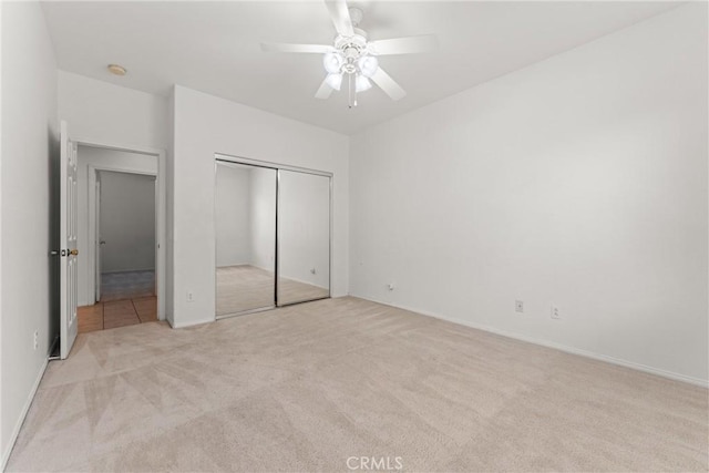42619 Meridian Way, Lancaster, CA 93536 - unfurnished bedroom featuring carpet, a closet, and ceiling fan
