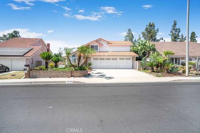 20329 Rim Ridge Rd, Walnut, CA 91789 - view of front of property with driveway and a garage
