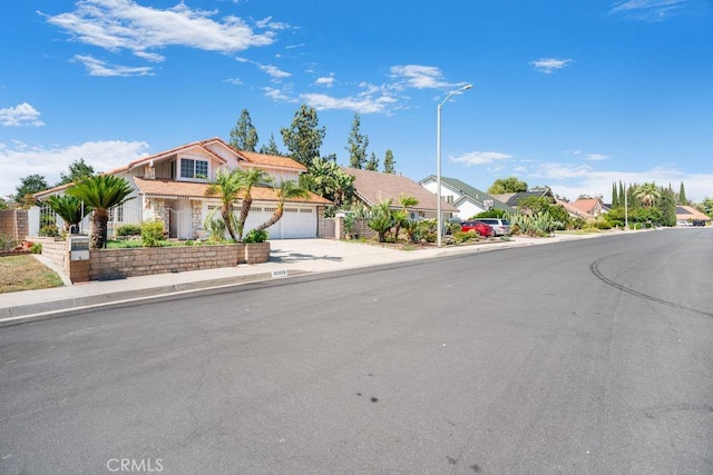 20329 Rim Ridge Rd, Walnut, CA 91789 - view of front of property with driveway, a residential view, and a garage