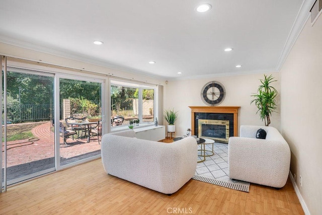 20329 Rim Ridge Rd, Walnut, CA 91789 - living room featuring light wood finished floors, crown molding, a glass covered fireplace, and recessed lighting