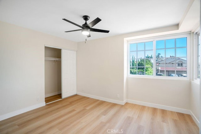 20329 Rim Ridge Rd, Walnut, CA 91789 - unfurnished bedroom featuring light wood-style floors, a closet, and a ceiling fan