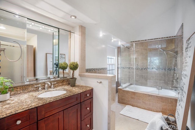 20329 Rim Ridge Rd, Walnut, CA 91789 - bathroom featuring tiled shower / bath, vanity, and tile patterned flooring
