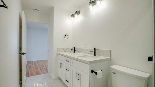856 W 47th St, Los Angeles, CA 90037 - full bath with double vanity and marble finish floors