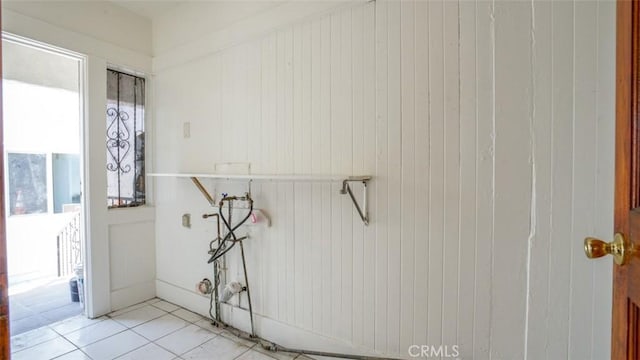 856 W 47th St, Los Angeles, CA 90037 - washroom with light tile patterned floors and wood walls