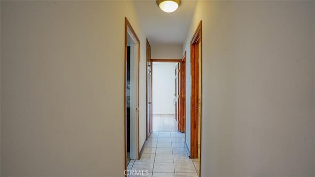 856 W 47th St, Los Angeles, CA 90037 - corridor featuring light tile patterned flooring