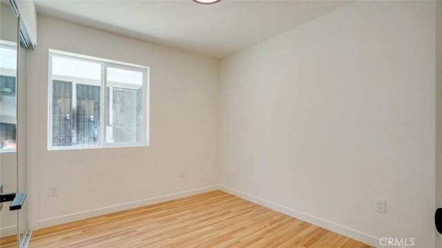 856 W 47th St, Los Angeles, CA 90037 - spare room featuring light wood-style flooring and baseboards