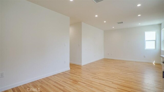 856 W 47th St, Los Angeles, CA 90037 - spare room featuring recessed lighting and light wood-style floors