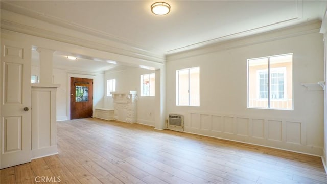 856 W 47th St, Los Angeles, CA 90037 - foyer featuring crown molding and light wood-type flooring