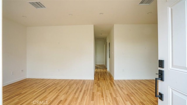 856 W 47th St, Los Angeles, CA 90037 - empty room with light wood finished floors and baseboards