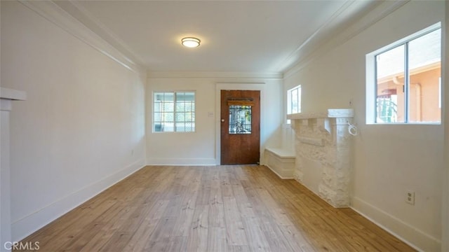 856 W 47th St, Los Angeles, CA 90037 - entrance foyer featuring light wood-style floors and ornamental molding