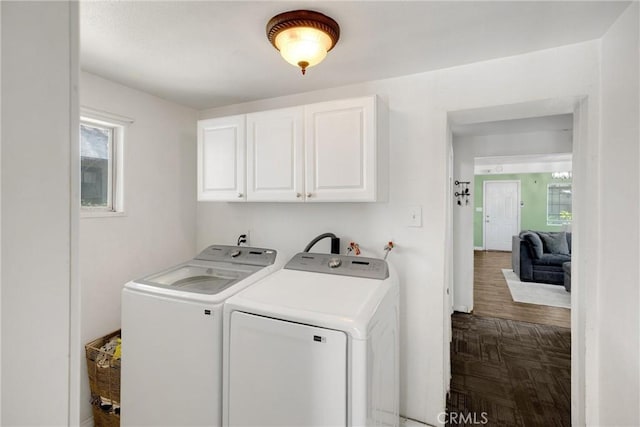 1003 Stevenson St, Colton, CA 92324 - washroom featuring cabinet space, independent washer and dryer, and parquet flooring