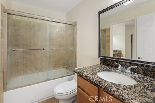 1313 Massachusettes Ave Unit 203, Riverside, CA 92507 - full bath featuring vanity and bath / shower combo with glass door