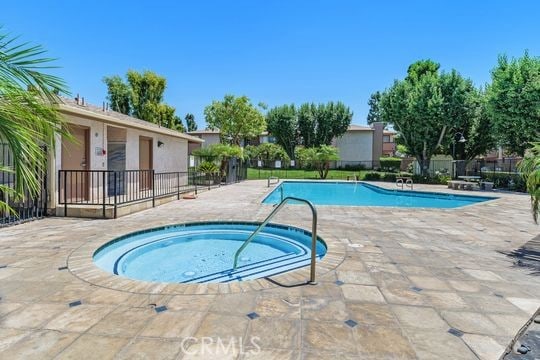 1313 Massachusettes Ave Unit 203, Riverside, CA 92507 - community pool with a patio area and a hot tub