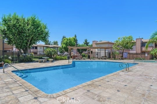 1313 Massachusettes Ave Unit 203, Riverside, CA 92507 - community pool with a patio area