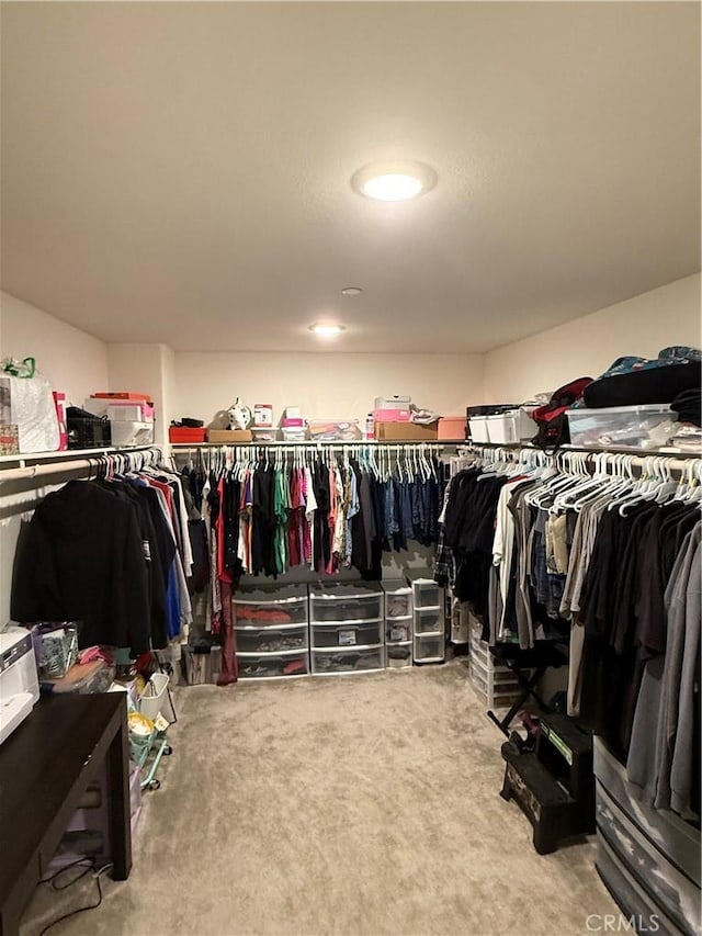12708 Ojo Caliente St, Victorville, CA 92392 - spacious closet featuring carpet