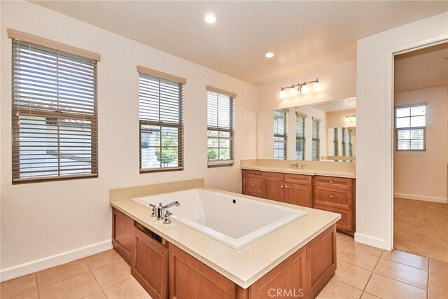 245 Snapdragon Ln, Glendora, CA 91741 - bathroom with tile patterned flooring, a bath, plenty of natural light, recessed lighting, and vanity
