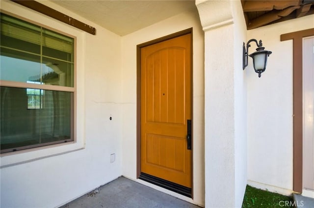 245 Snapdragon Ln, Glendora, CA 91741 - doorway to property featuring stucco siding