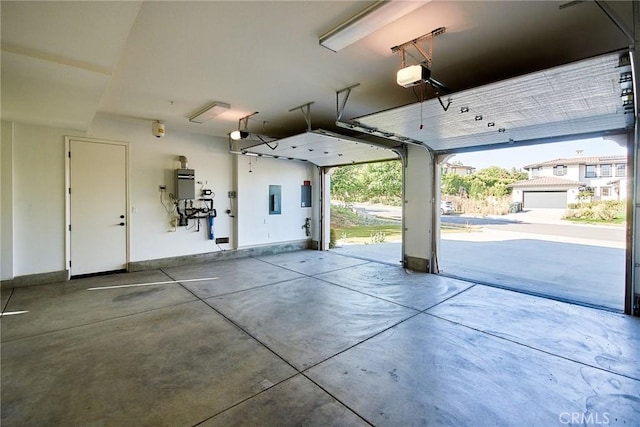 245 Snapdragon Ln, Glendora, CA 91741 - garage with electric panel and a garage door opener