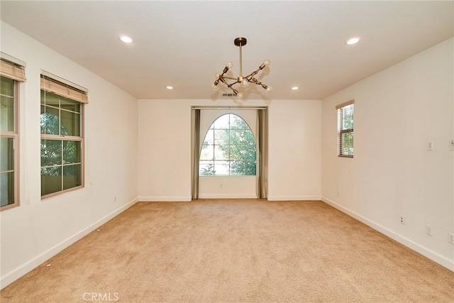 245 Snapdragon Ln, Glendora, CA 91741 - unfurnished room featuring light colored carpet, recessed lighting, and a chandelier