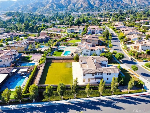 245 Snapdragon Ln, Glendora, CA 91741 - aerial perspective of suburban area with a pool area and a mountainous background