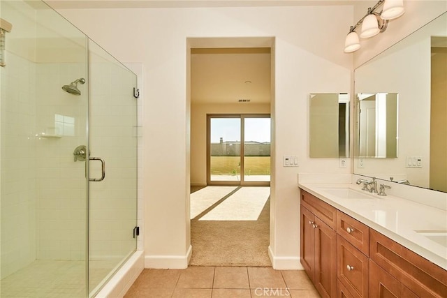 245 Snapdragon Ln, Glendora, CA 91741 - bathroom featuring a stall shower, double vanity, and tile patterned floors