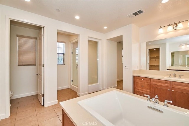 245 Snapdragon Ln, Glendora, CA 91741 - full bathroom featuring vanity, tile patterned flooring, recessed lighting, a bathtub, and a shower stall