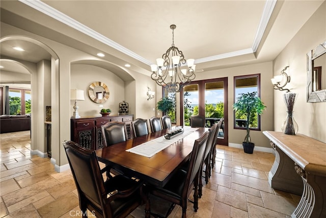 43650 La Cruz Dr, Temecula, CA 92590 - dining space with stone tile floors, a tray ceiling, recessed lighting, a chandelier, and ornamental molding