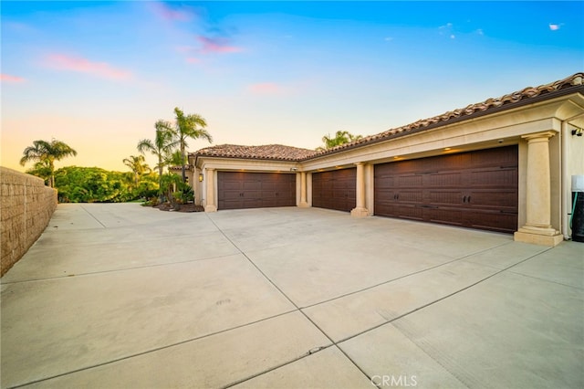 43650 La Cruz Dr, Temecula, CA 92590 - garage at dusk with driveway
