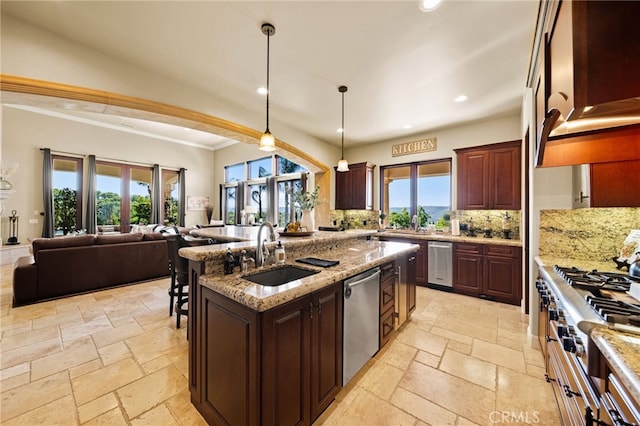 43650 La Cruz Dr, Temecula, CA 92590 - kitchen featuring stainless steel appliances, stone tile floors, open floor plan, recessed lighting, and backsplash