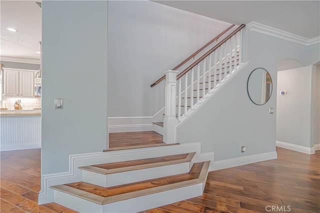 25531 Durant Pl, Stevenson Ranch, CA 91381 - stairway with wood-type flooring, crown molding, and recessed lighting