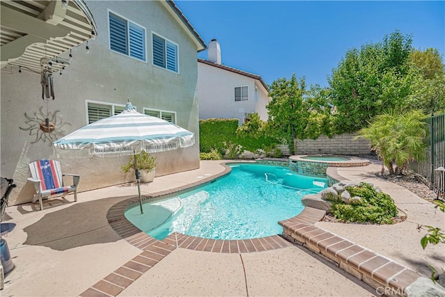 25531 Durant Pl, Stevenson Ranch, CA 91381 - view of swimming pool featuring a patio area, a pool with connected hot tub, and a fenced backyard