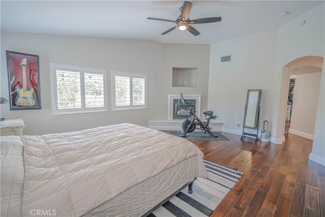 25531 Durant Pl, Stevenson Ranch, CA 91381 - bedroom featuring arched walkways, wood finished floors, a ceiling fan, and vaulted ceiling