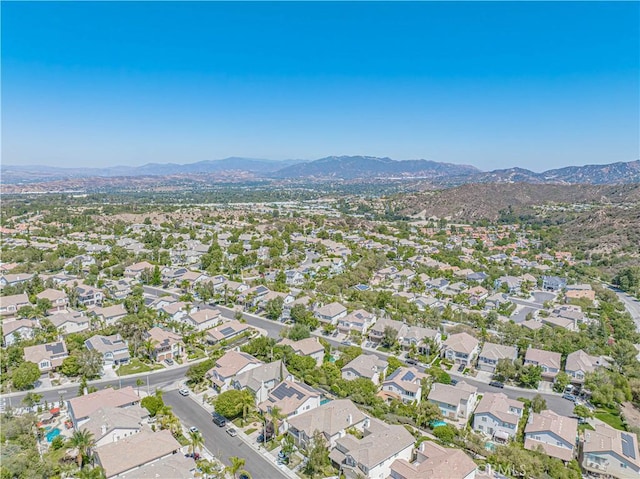 25531 Durant Pl, Stevenson Ranch, CA 91381 - aerial view of property's location with a mountainous background and nearby suburban area