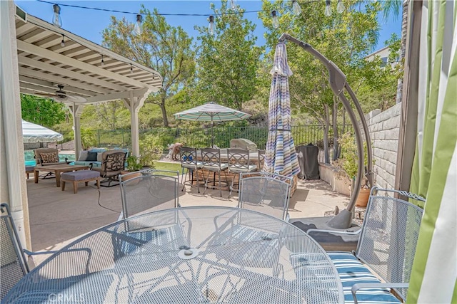 25531 Durant Pl, Stevenson Ranch, CA 91381 - fenced backyard with outdoor dining space, an outdoor hangout area, and a patio