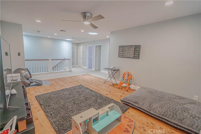 25531 Durant Pl, Stevenson Ranch, CA 91381 - living area with an upstairs landing, wood finished floors, a ceiling fan, and recessed lighting