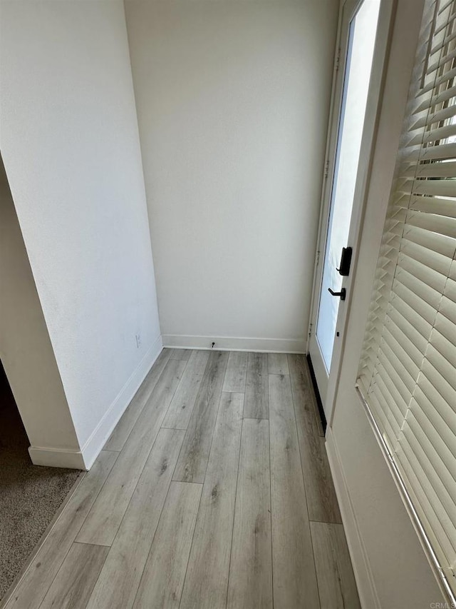 2170 Birch Rd Unit 111, Chula Vista, CA 91915 - spare room featuring light wood-type flooring and baseboards