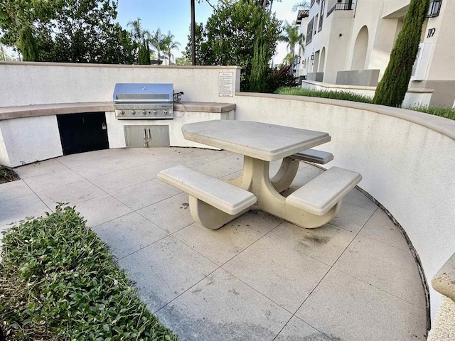 2170 Birch Rd Unit 111, Chula Vista, CA 91915 - view of patio / terrace with an outdoor kitchen