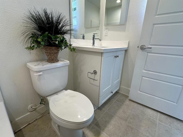 2170 Birch Rd Unit 111, Chula Vista, CA 91915 - half bathroom with vanity and a textured wall