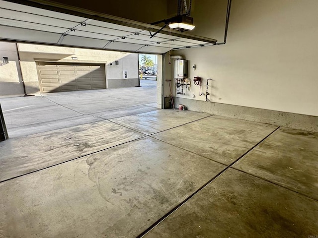 2170 Birch Rd Unit 111, Chula Vista, CA 91915 - garage with a garage door opener and gas water heater