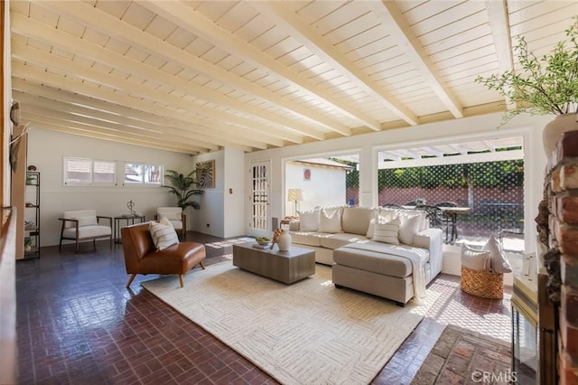 1137 Lafayette St, San Gabriel, CA 91776 - living room featuring brick patterned flooring and a wooden ceiling with exposed beams